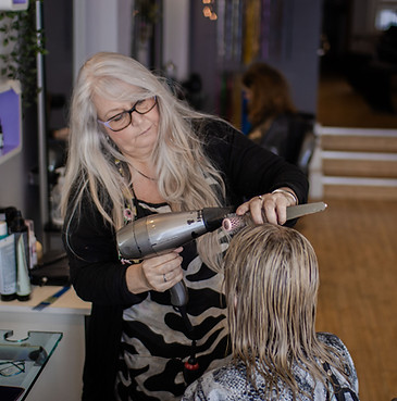 Vanessa doing a blow dry.