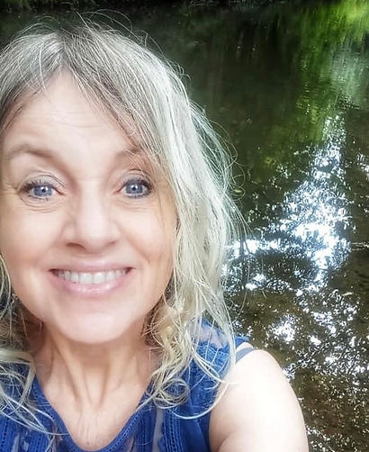 Jo smiling by river.jpg