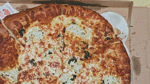 pizza in box, handing reaching out for slice