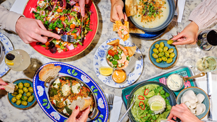 Bill's restaurant - food on plates and hands eating