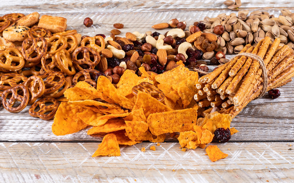 side-view-different-kind-snacks-as-nuts-crackers-cookies-white-wooden-surface-horizontal (