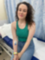 Woman sitting in hospital clinic for breast cancer.