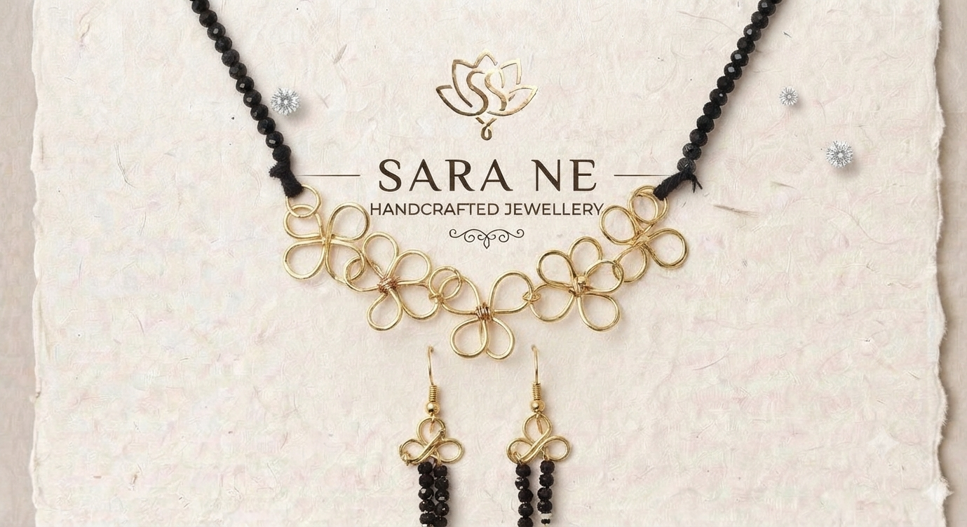 Floral gold tone wire & black bead jewellery set