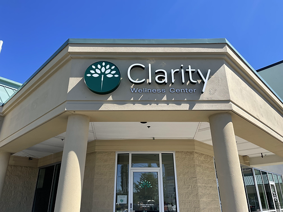 Front of building with sign that says Clarity Wellness Center