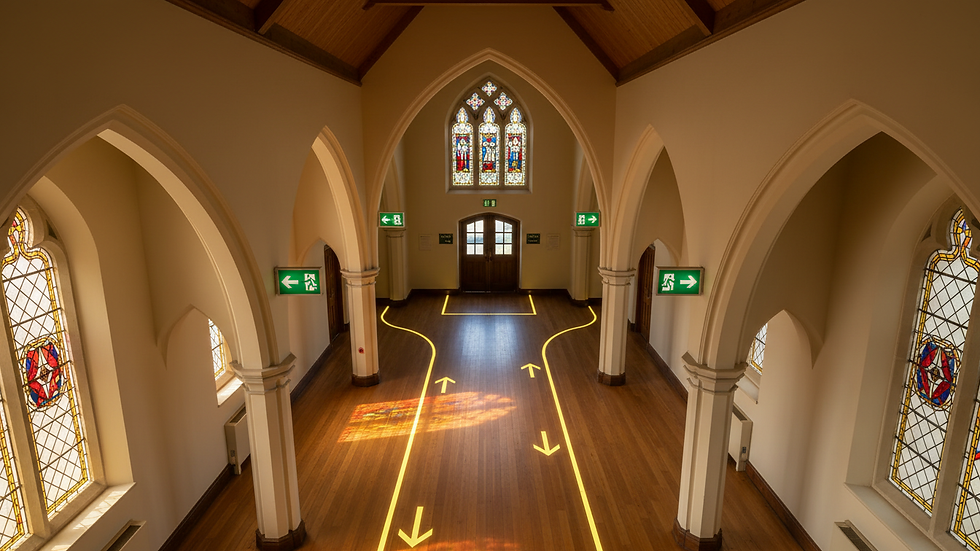 High angle view of emergency exit signs and clear evacuation routes in church hallway