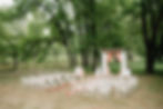 wedding-ceremony-area-arch-chairs-decor.jpg