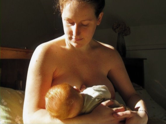 Mom breastfeeding baby