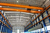 Overhead crane runway with Span-Guard conductor power and festoon cable systems supporting crane movement