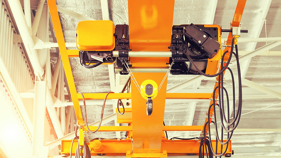 Overhead crane cable reel managing power cable during equipment travel