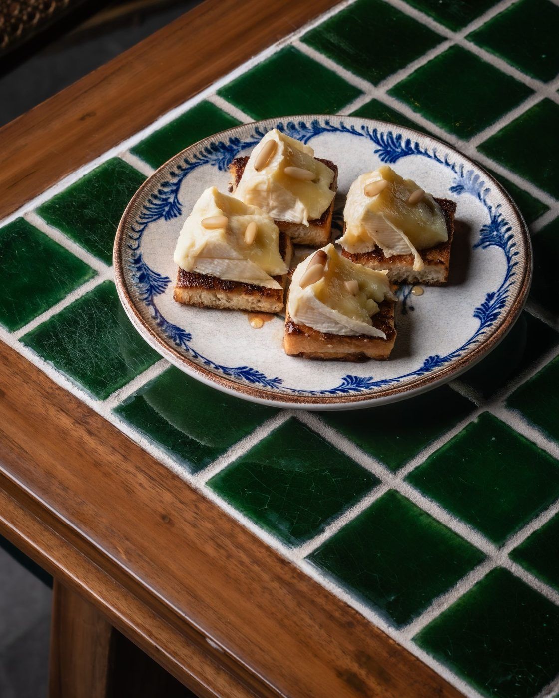 Honey cheese toast on green tiles