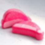 2 bath bombs in a Santa hat design