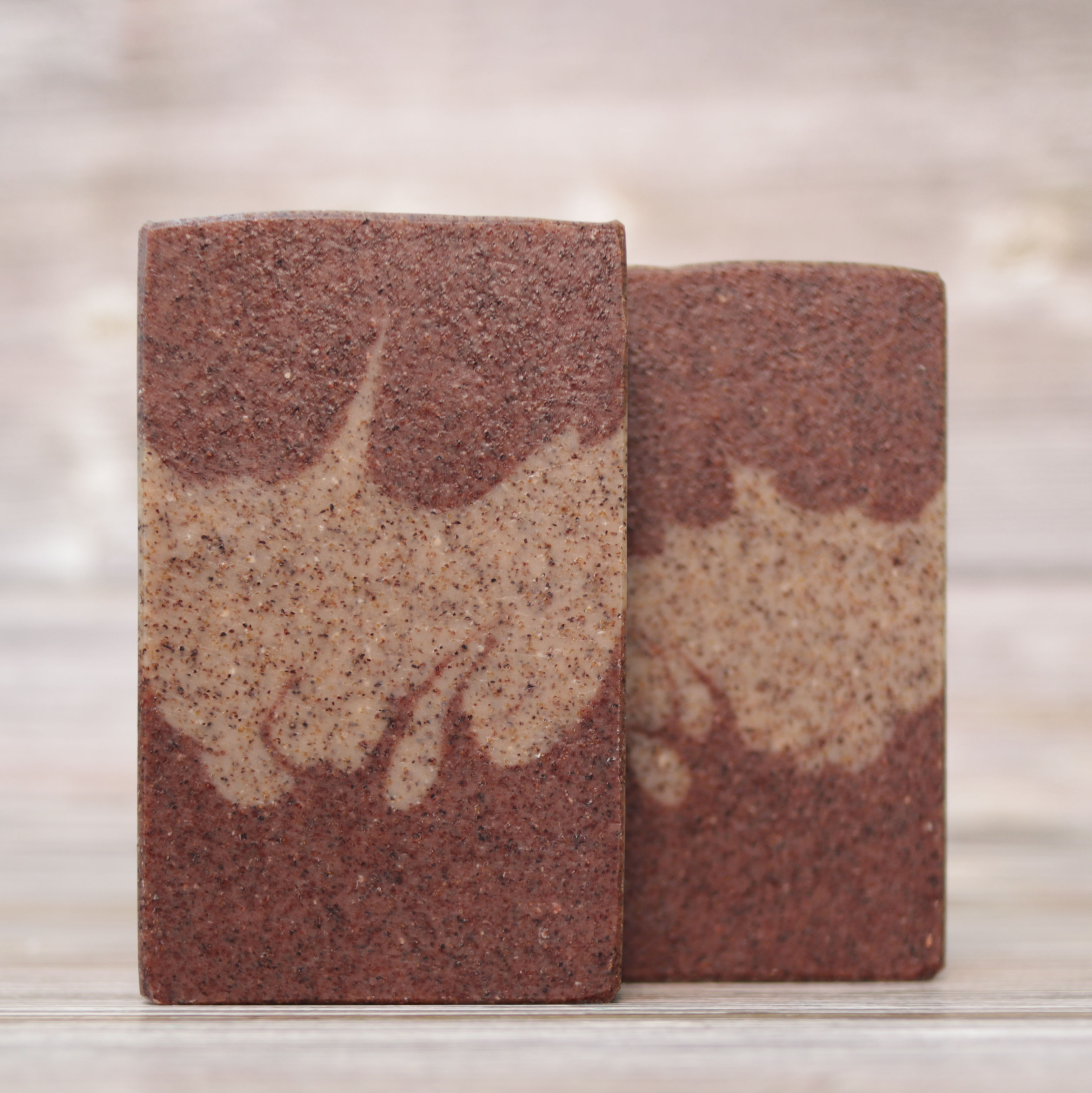 two bars of luxury natural handmade soap with natural exfoliants to clean hardworking hands
