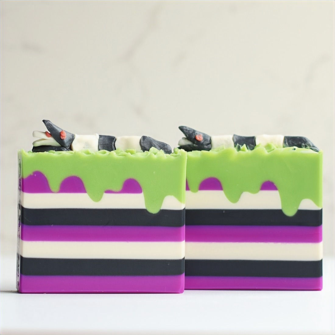 Two luxury handmade soaps created using Drips Scraper