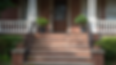 pngtree-the-front-steps-of-a-brick-home-are-decorated-with-potted-picture-image_3120895.jp
