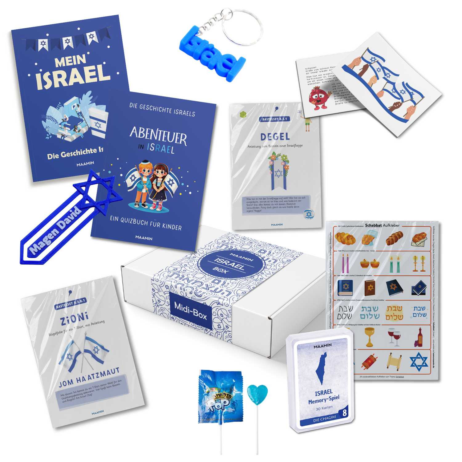 Contents of the Israel Box for children including quiz books, craft kits, memory game and stickers in German