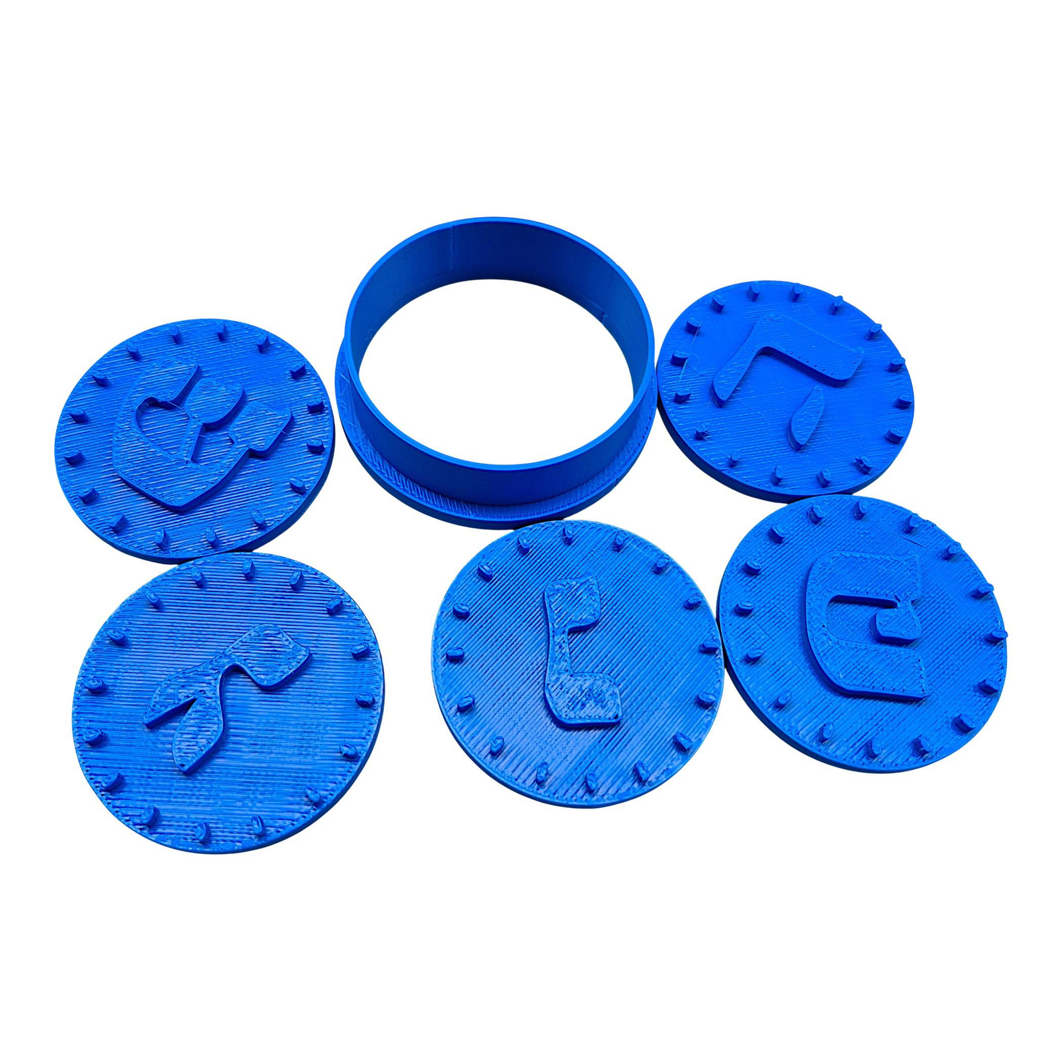 Dreidel Ausstechform Set mit fünf blauen Stempeln für traditionelle Chanukka-Plätzchen mit hebräischen Motiven