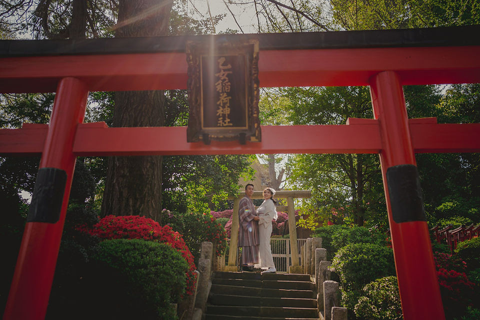 In front of torii gates at Nezu shrine, tokyo