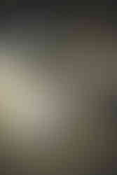 Couple sharing a joyful moment under city lights during their fantasy-themed pre-wedding photo shoot in Tokyo