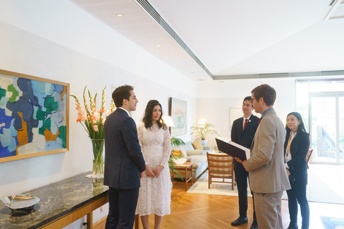 Intimate wedding ceremony at the Embassy of Sweden in Tokyo with embassy staff witnessing the elopement