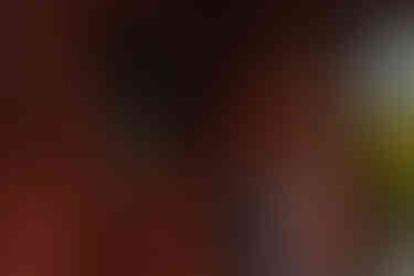 Close-up of a couple in traditional kimono posing inside Zojoji Temple gate during their Tokyo Tower pre-wedding photoshoot.