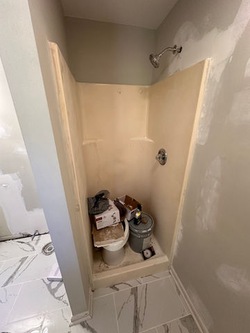 before photo of shower refinishing project in residential bathroom