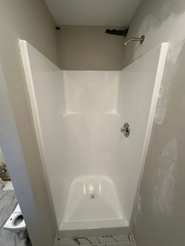 after photo of shower refinishing project in residential bathroom