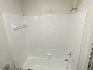 After comparison of a bathroom showcasing the transformation achieved through tile refinishing.