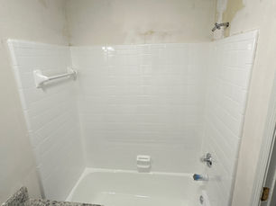 After comparison of a bathroom showcasing the transformation achieved through tile refinishing.