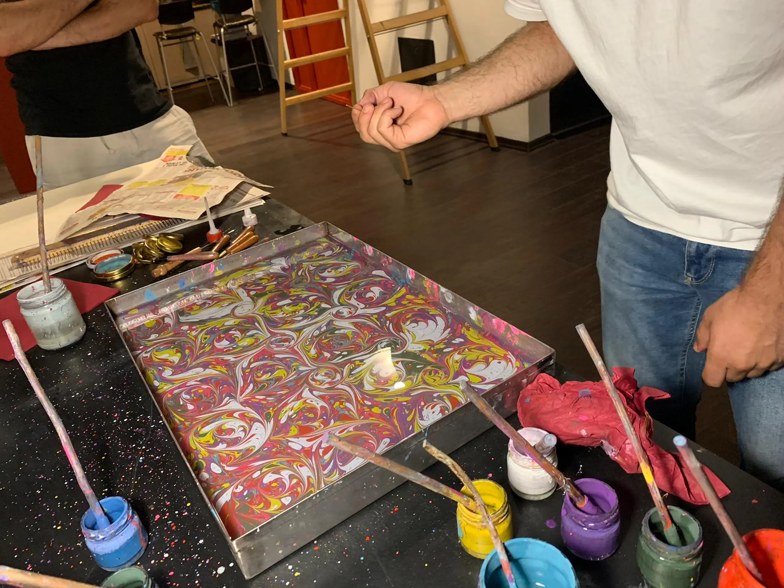 Colorful marbling patterns created on water