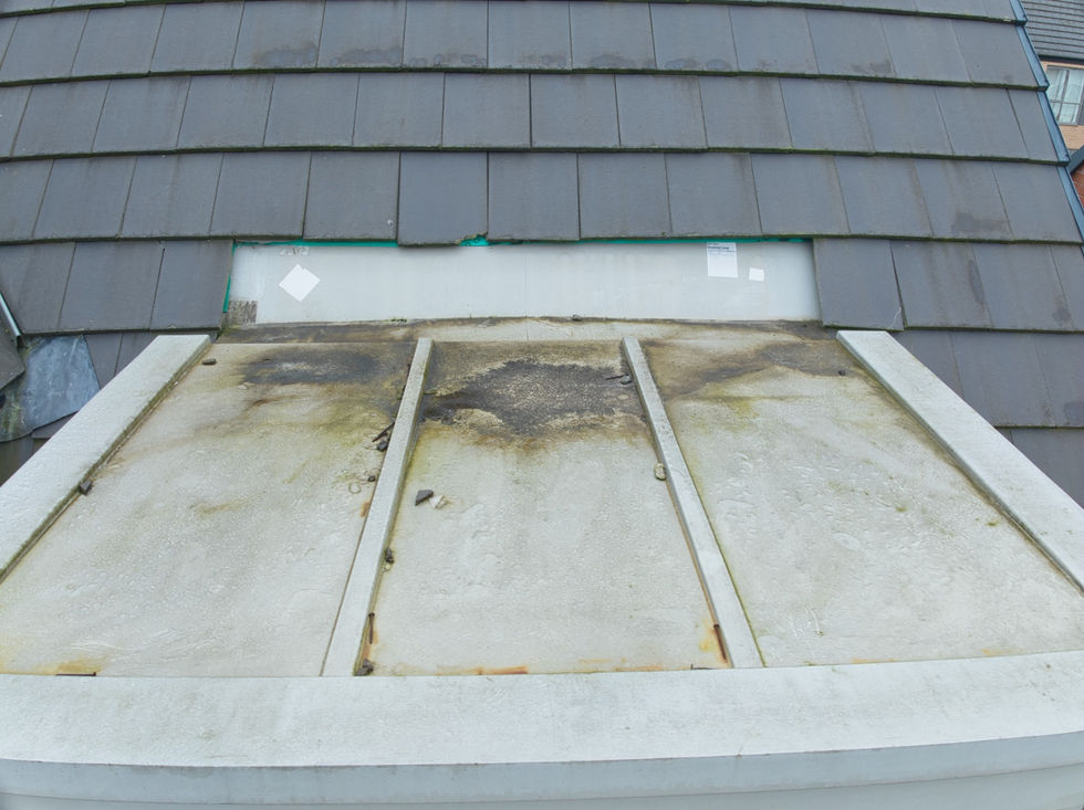 Drone image of a dormer flat roof inspection for damage.