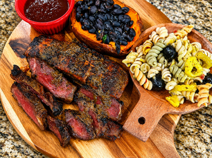 STEAK, STUFFED SWEET POTATO, AND PASTA SALAD.