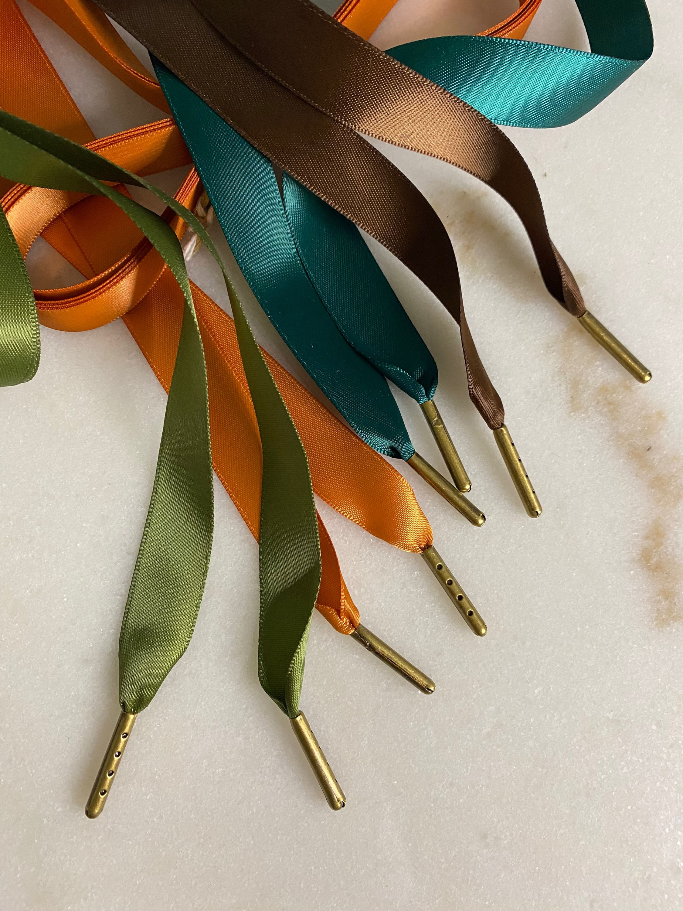 Satin ribbon lacing with bronze aglets