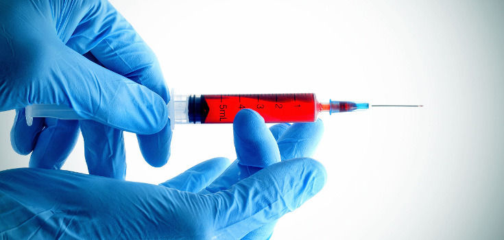 vaccine_red_glove_735_350.jpg