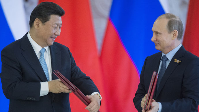 russia-china-deals-cooperation.si.jpg