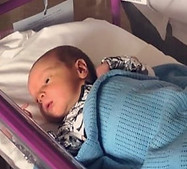 Your Midwife giving care to one of her newborns