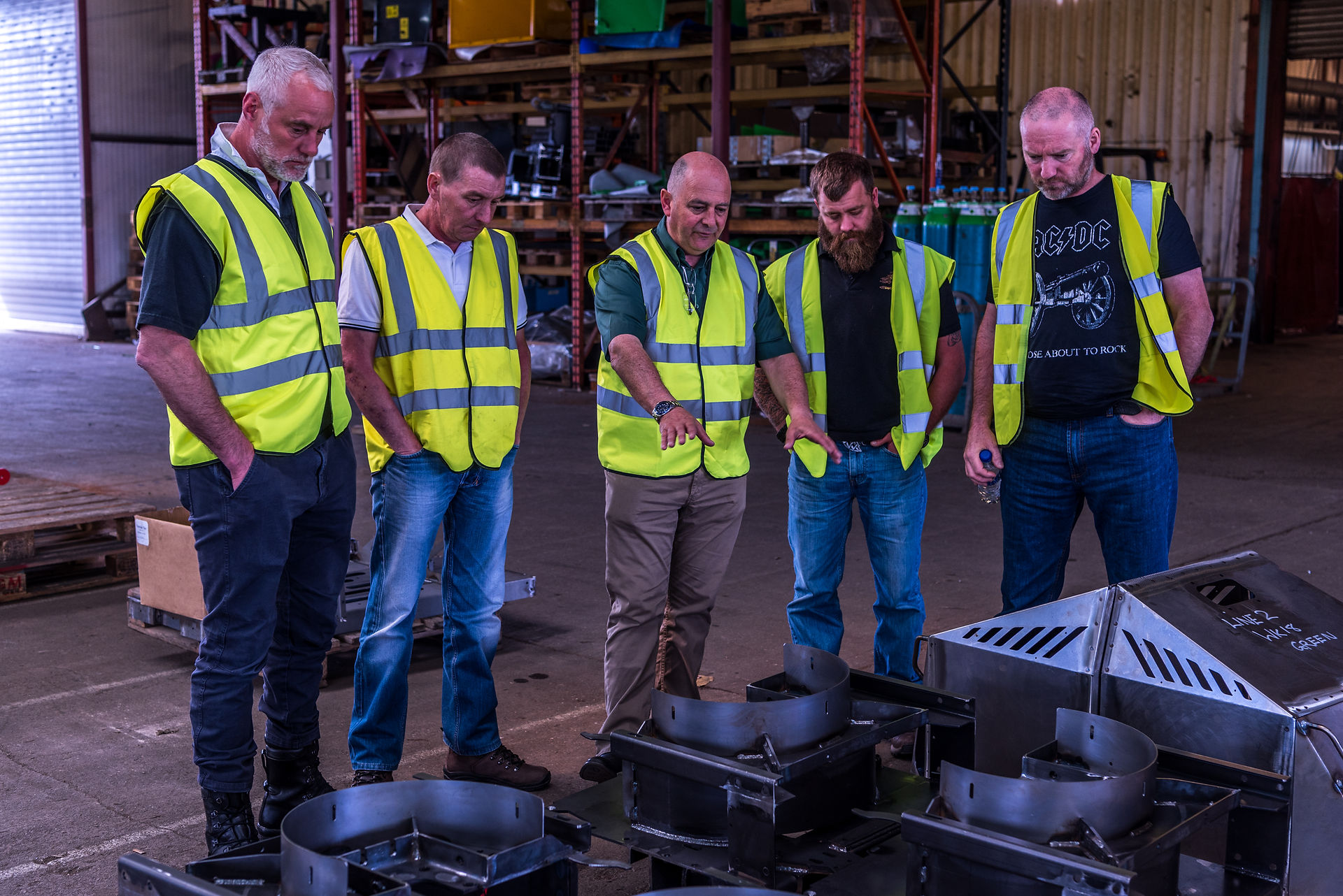 Fly wheels with a group of blokes looking intense
