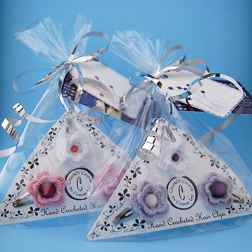 packaged trio of flower hairclips.jpeg