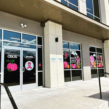 hand painted storefront graphics and lettering on window glass