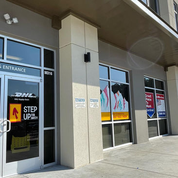 hand painted storefront graphics and lettering on window glass