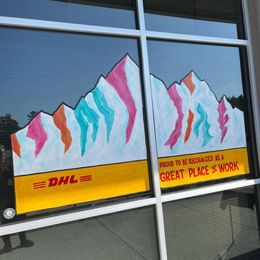 hand painted storefront graphics and lettering on window glass