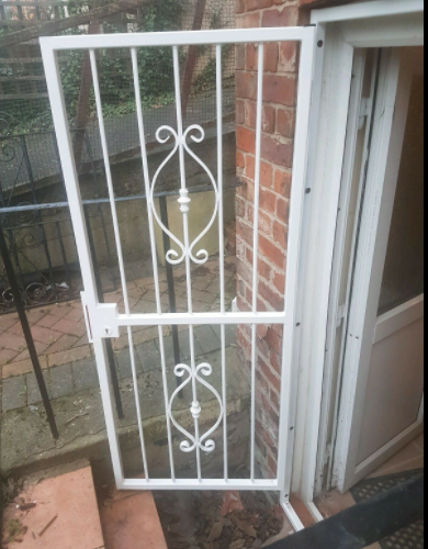 MH26, Decorative Framed  security Gate with Key Lock shown open