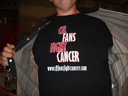 The first shirt we ever sold in 2007 - black with a red and white CFL Fans Fight Cancer Logo