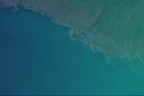 a body of water with land around it_edited.jpg