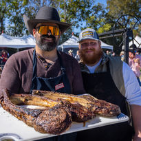 Wade Elkins grills Tomahawks in the Ring of FIre. Photo by Emily Jaschke.jpeg