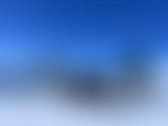 Óskar in his KLIM gear standing next to his Scherco snowbike in the north of Iceland.