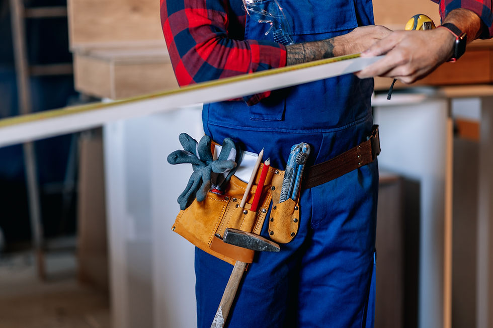young-male-carpenter-working-in-workshop-and-measu-2023-11-27-04-57-20-utc.jpg