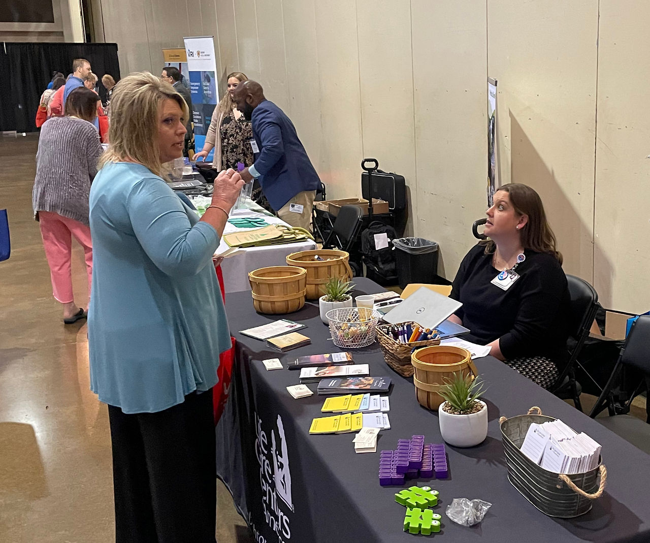 Attendees visit vendors 