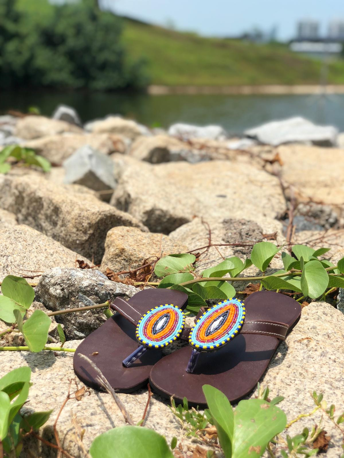 Brown leather, blue and orange sandals