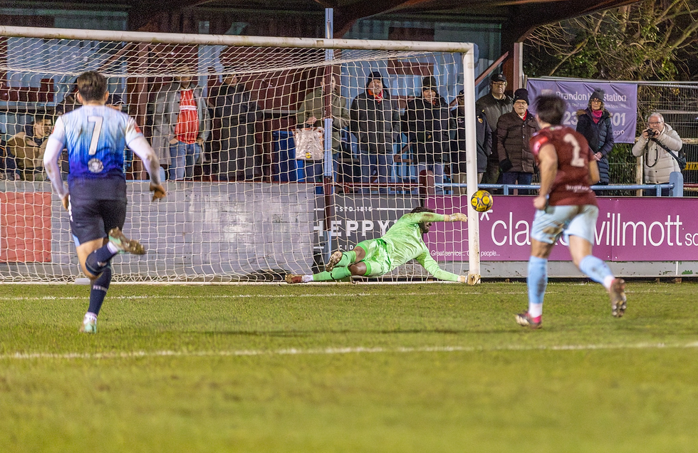 Josh Gould  makes a brilliant save from Albie's  penalty. The penalty was right in the corner  but Josh is a big guy  and produced a magnificent save.
