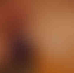 Terracotta sofa and Wall | DIONE Interiors Blog | 10 TOP Afrofusion Ideas to Furnish Your Holiday Rental